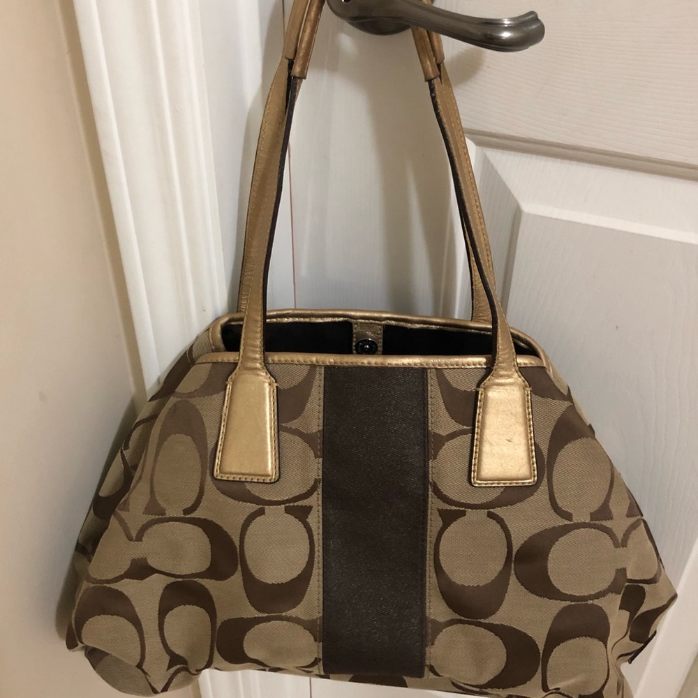 Coach signature tote/gold leather trim
